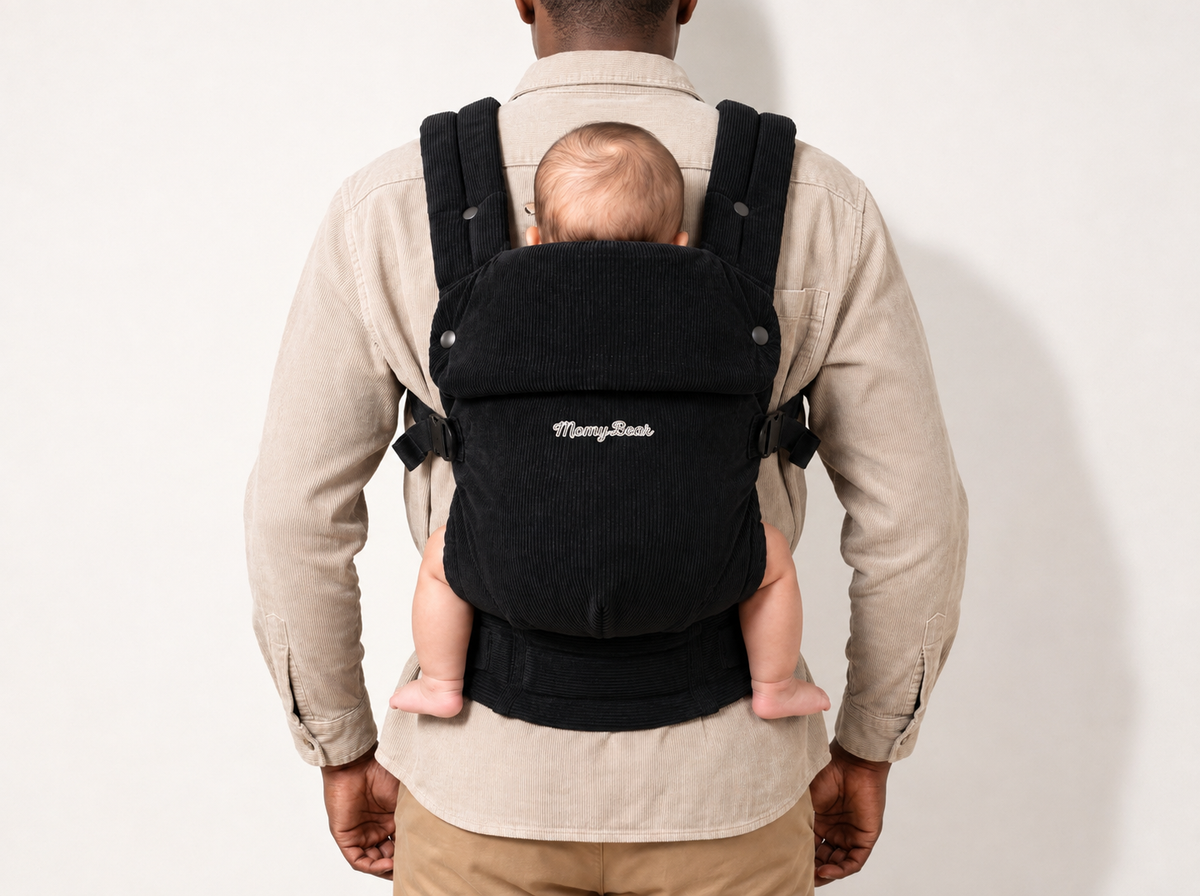 Porte-bébé Pure Velvet noir porté avec bébé de dos