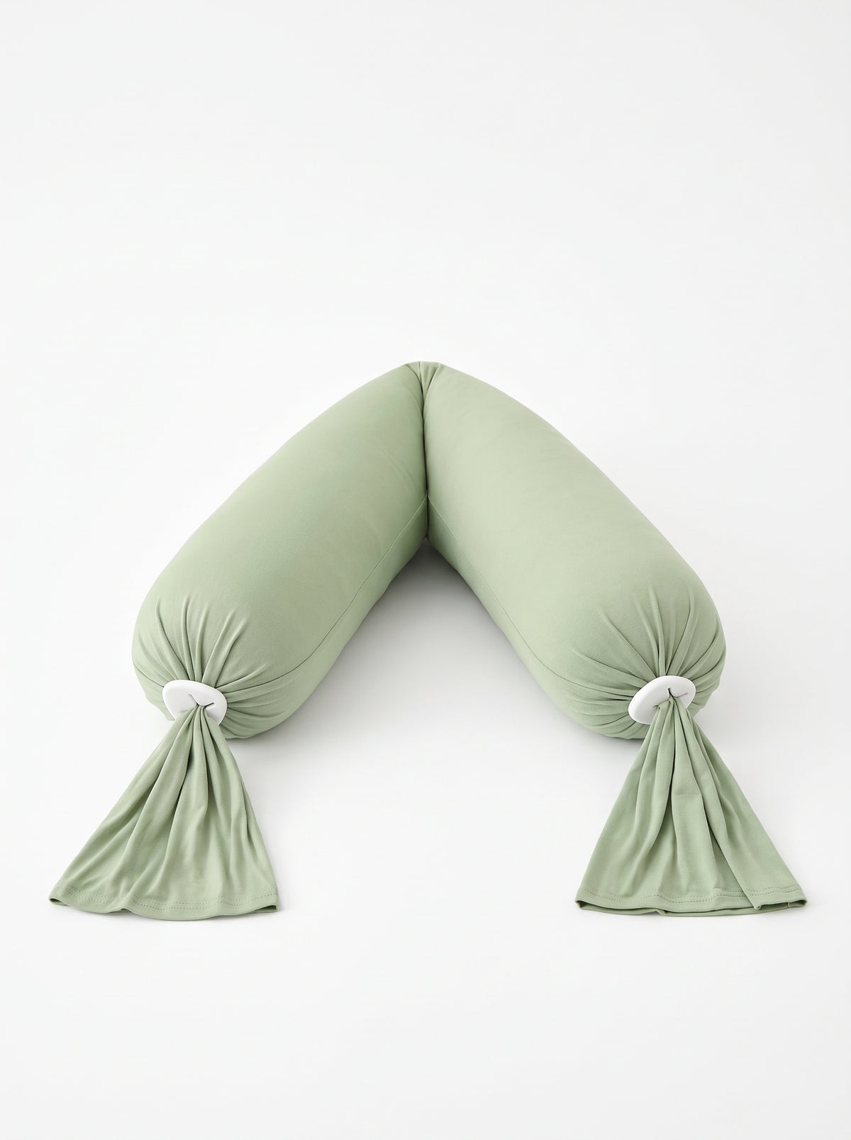 Coussin de grossesse & d'allaitement vert sur fond blanc
